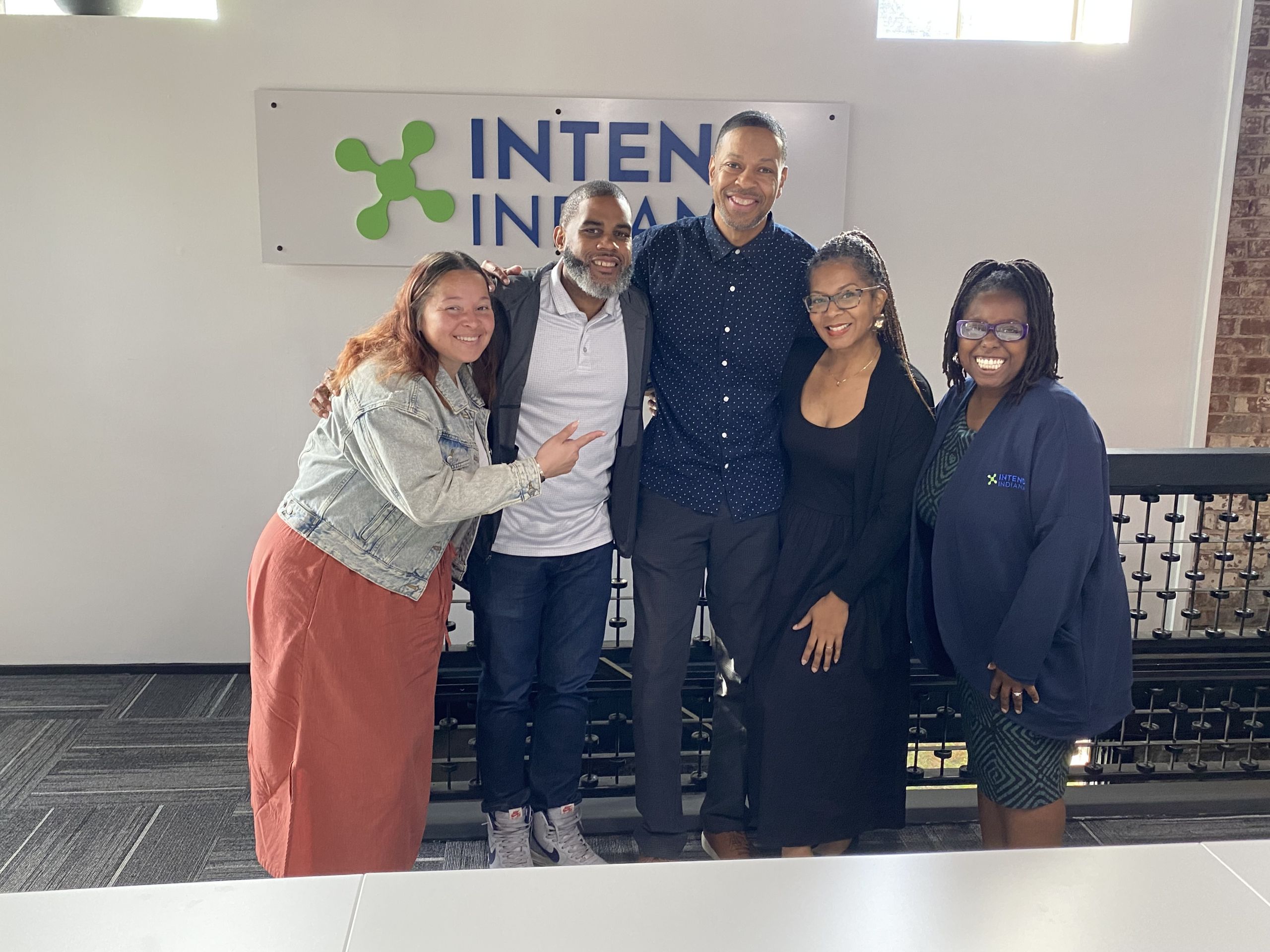 Exponential Equity Group members and Intend Indiana members pose for a picture.