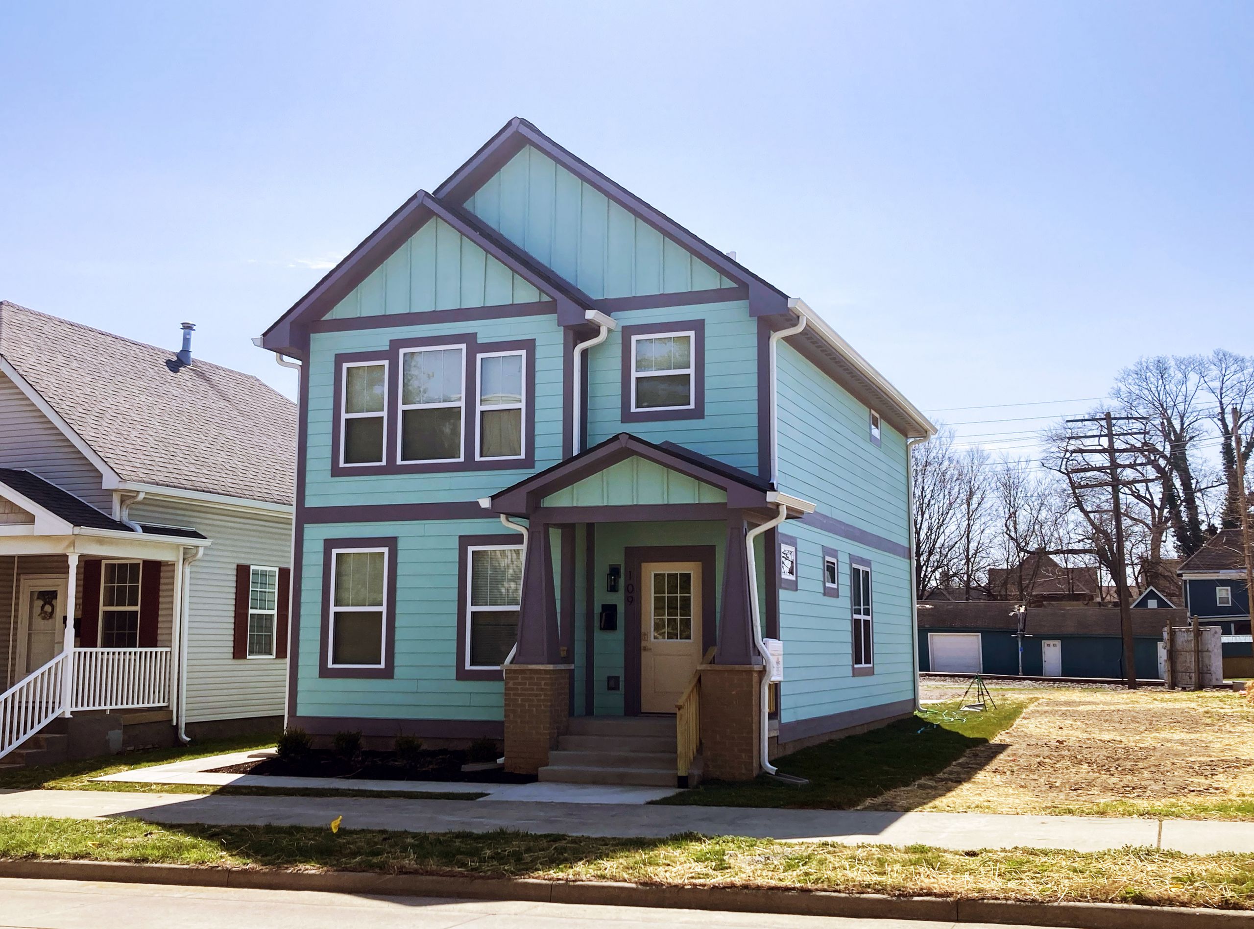 Walker-Shovey_March-2026-scaled two story lighter blue home built by Affordable HomeMatters